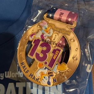 2024 Disney Half Marathon shirt and medal